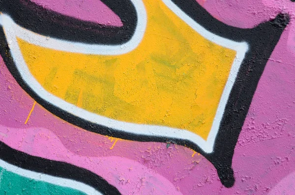 Fragment of a beautiful graffiti pattern in pink and green with a black outline. Street art background image