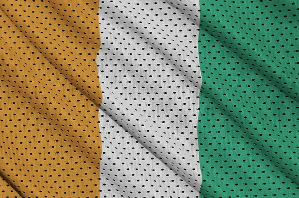 Elfenbenskusten flagga tryckt på en polyester nylon sportkläder mesh fa — Stockfoto