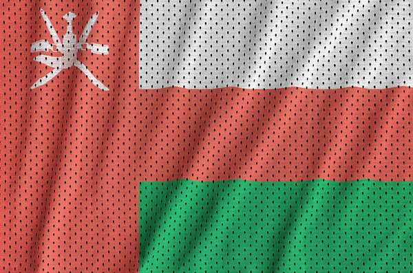 Oman flag printed on a polyester nylon sportswear mesh fabric wi — Stock Photo, Image