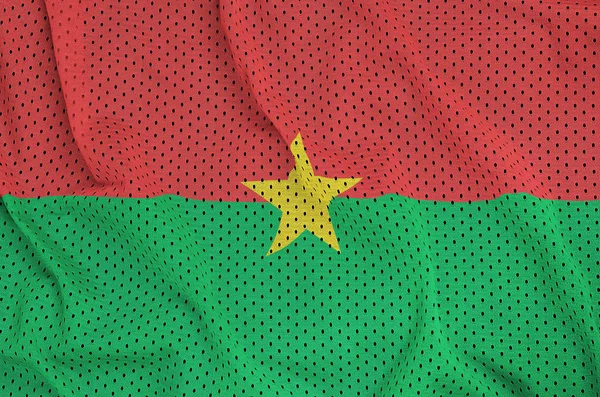 Burkina Faso flag printed on a polyester nylon sportswear mesh f — Stock Photo, Image