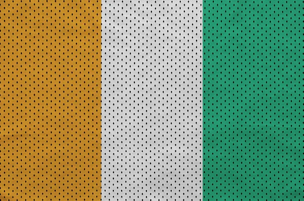 Ivory Coast flag printed on a polyester nylon sportswear mesh fa — Stock Photo, Image