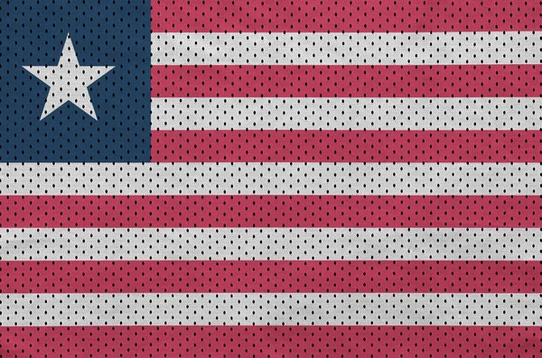 Liberias flagga tryckt på en polyester nylon sportkläder mesh tyg — Stockfoto