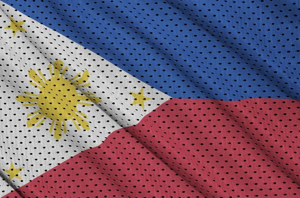 いくつかの襞を持つポリエステル ナイロン スポーツ メッシュ生地に印刷されたフィリピンの旗 — ストック写真
