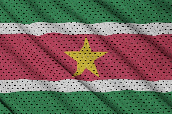 수리남의 국기는 폴 리 에스테 나일론 스포츠 메쉬 fabri에 인쇄 — 스톡 사진