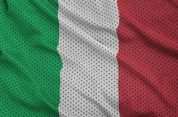 Italy flag printed on a polyester nylon sportswear mesh fabric w — Stock Photo, Image