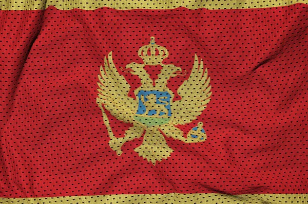 Vlag van Montenegro afgedrukt op een polyester nylon sportkleding mesh fab — Stockfoto