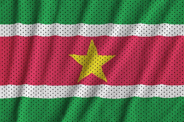 Bandeira do Suriname impressa em uma malha de poliéster nylon sportswear fabri — Fotografia de Stock