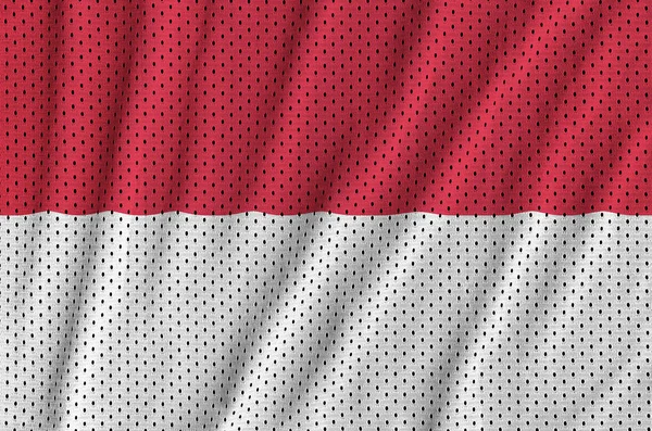 Bendera Monaco dicetak pada kain pakaian olahraga poliester nilon — Stok Foto