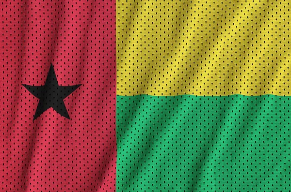几内亚比绍国旗印在聚酯尼龙运动服网 — 图库照片