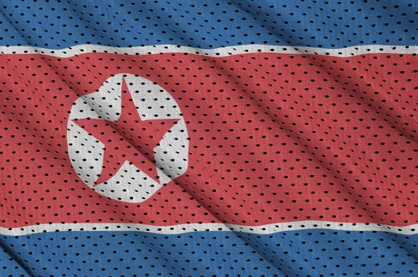 Kuzey Kore bayrağı polyester naylon spor giyim kafes SK baskılı — Stok fotoğraf