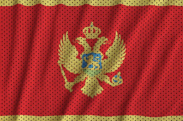 Montenegro Flagge auf einem Polyester-Nylon-Sportbekleidung Mesh-Fabrik gedruckt — Stockfoto