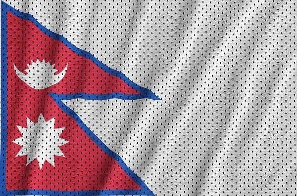 Nepal flag printed on a polyester nylon sportswear mesh fabric w — Stock Photo, Image