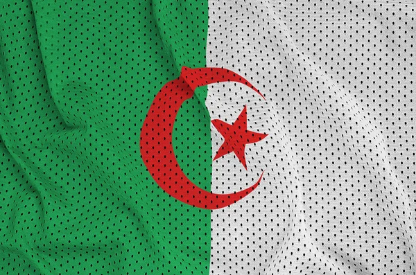 Algeria flag printed on a polyester nylon sportswear mesh fabric — Stock Photo, Image