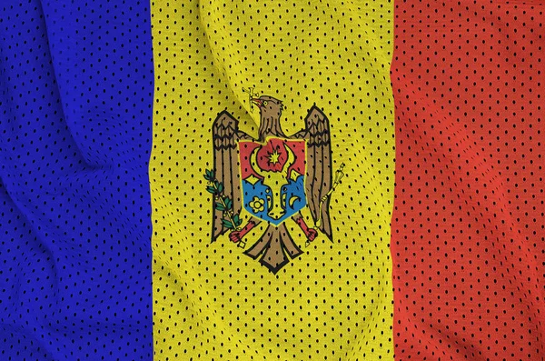 Moldova flag printed on a polyester nylon sportswear mesh fabric — Stock Photo, Image