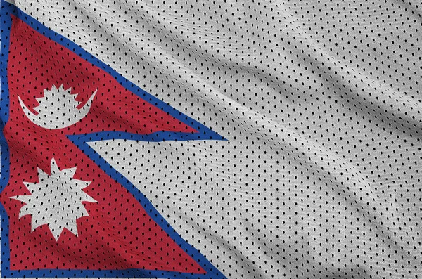 Nepal flag printed on a polyester nylon sportswear mesh fabric w — Stock Photo, Image
