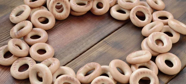 Egy Csomó Friss Sárga Bagels Hazugság Felszínen Régi Sötét Népszerű — Stock Fotó