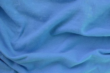 Mavi renkli kumaş dokusu. Gömlek ve bluz yapmak için malzeme