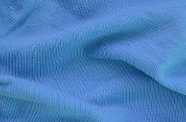 Mavi renkli kumaş dokusu. Gömlek ve bluz yapmak için malzeme