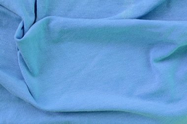 Mavi renkli kumaş dokusu. Gömlek ve bluz yapmak için malzeme