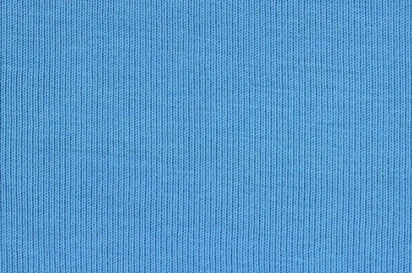 La texture del tessuto in colore blu. Materiale per realizzare camicie e camicette — Foto Stock