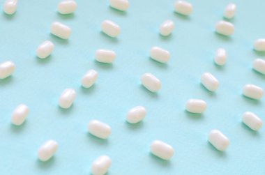 Tic tac hard mints pattern close up. Tic tac is popular due its minty fresh taste and easy to carry. Hard mints produced by Ferrero since 1968