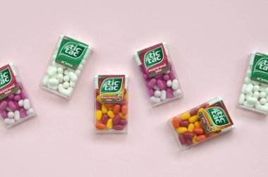 Many Tic Tac Candy packages. Tic tac is popular due its minty fresh taste and easy to carry. Hard mints produced by Ferrero since 1968 clipart