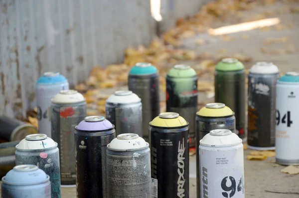KHARKOV, UKRAINE - OCTOBER 19, 2019: Montana mtn 94 black hardcore dope and kobra used spray cans for graffiti painting outdoors in autumn leafs — Stock Photo, Image
