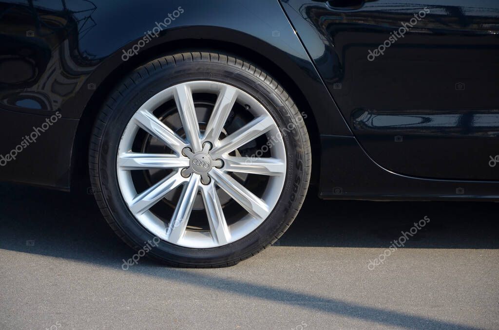 KHARKOV, UKRAINE - OCTOBER 21, 2019: Audi wheel close up. German automobile manufacturer that distributes luxury vehicles Est in 1885 as automobile company Wanderer