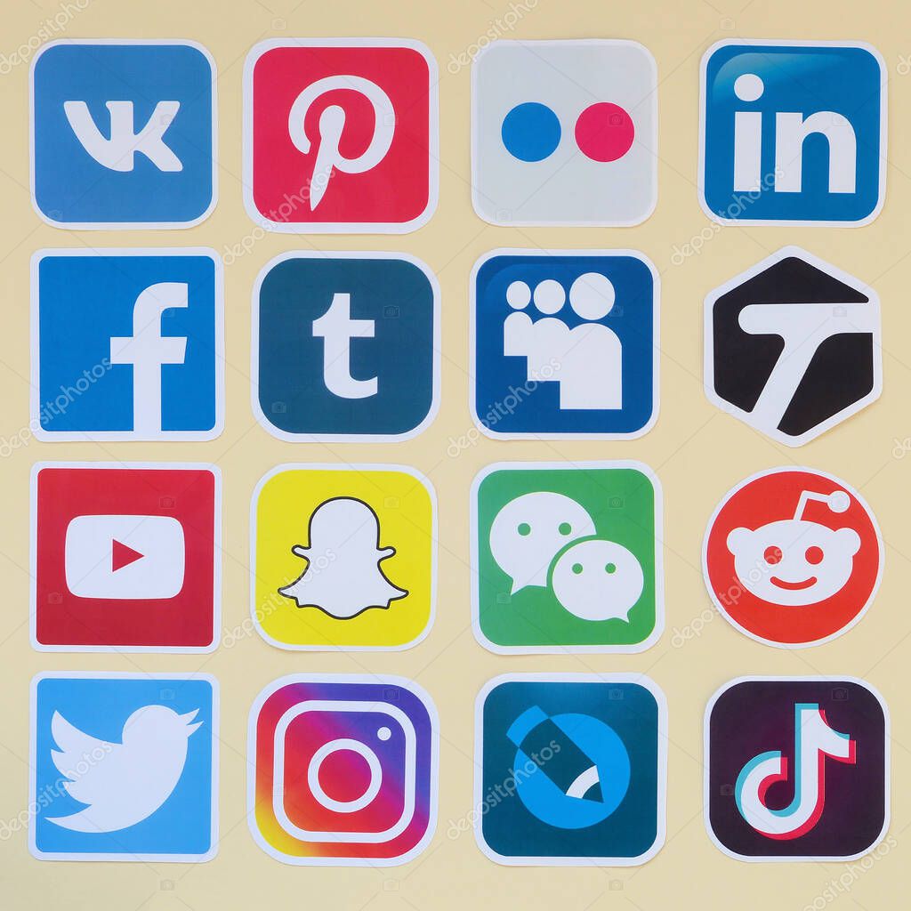 KHARKOV, UKRAINE - OCTOBER 17, 2019: Many paper icons with logo of most popular social networks and smartphone apps for chat and conversations online