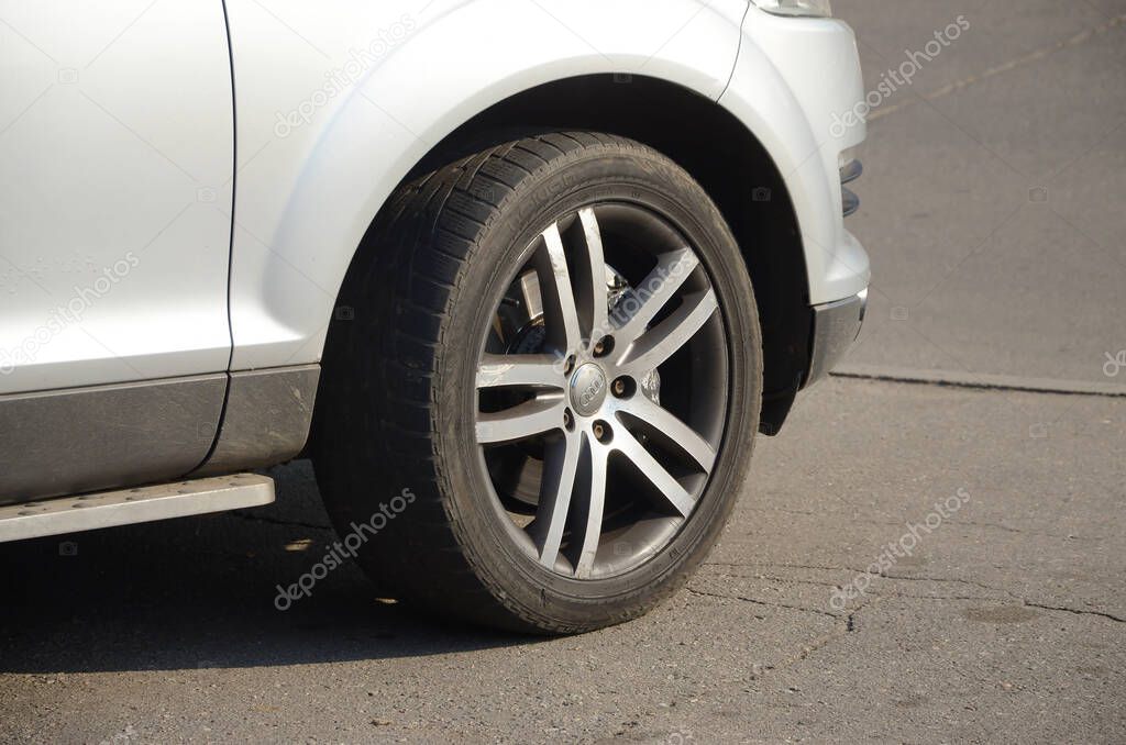 KHARKOV, UKRAINE - OCTOBER 21, 2019: Audi wheel close up. German automobile manufacturer that distributes luxury vehicles Est in 1885 as automobile company Wanderer
