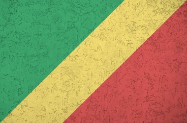 Kongo bayrağı, eski kabartma duvarda parlak boya renkleriyle resmedilmiş. Kabataslak arkaplanda desenli pankart