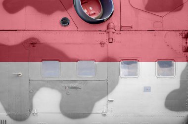 Askeri zırhlı helikopterin yan tarafında Endonezya bayrağı tasvir edildi. Ordu uçak kavramsal arka planını güçlendirir