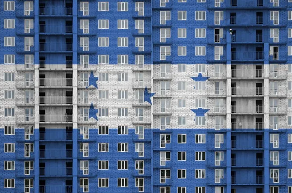 Флаг Гондураса Изображен Красках Строящемся Многоэтажном Жилом Здании Текстурированный Баннер — стоковое фото