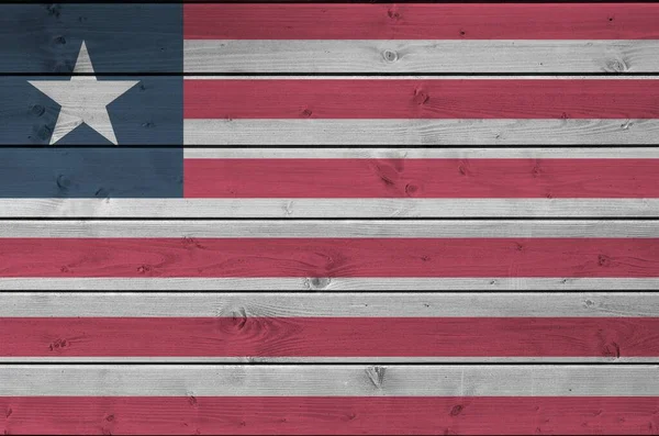 Bandiera Liberia Raffigurata Colori Vivaci Sulla Vecchia Parete Legno Vicino — Foto Stock