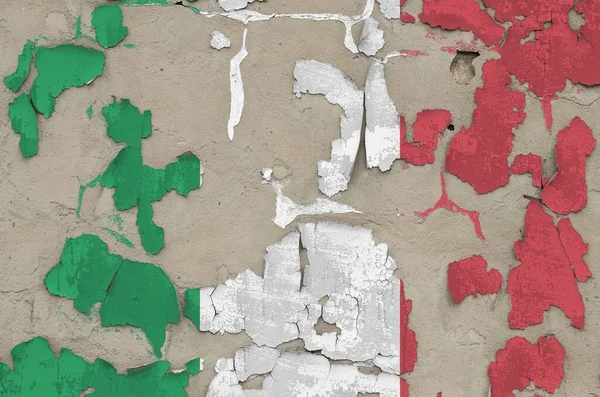 Italy flag depicted in paint colors on old obsolete messy concrete wall close up. Textured banner on rough background