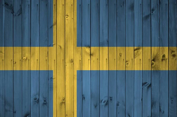 Švédská Vlajka Vyobrazená Jasných Barvách Staré Dřevěné Stěně Zblízka Texturovaný — Stock fotografie