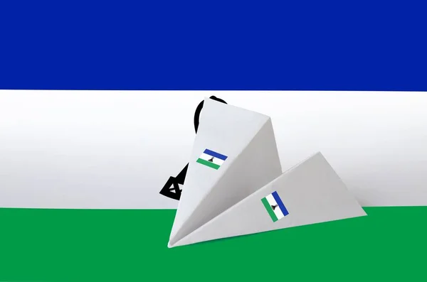 纸制折纸飞机上印有莱索托国旗 东方手工艺术概念 — 图库照片
