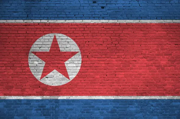 Bandeira Coreia Norte Retratada Cores Tinta Parede Tijolo Velho Perto — Fotografia de Stock