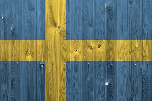 Švédská Vlajka Vyobrazená Jasných Barvách Staré Dřevěné Stěně Zblízka Texturovaný — Stock fotografie