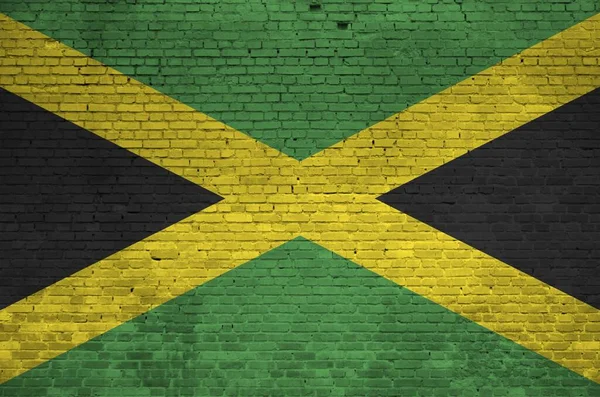 Bandeira Jamaica Retratada Cores Tinta Parede Tijolo Velho Perto Banner — Fotografia de Stock