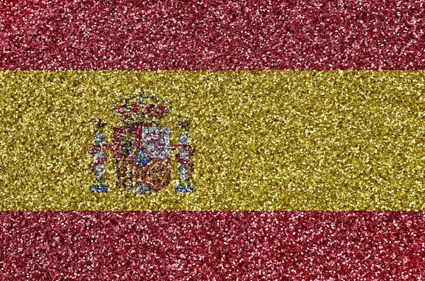 Spain flag depicted on many small shiny sequins. Colorful festival background for disco party