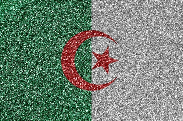 Algeria flag depicted on many small shiny sequins. Colorful festival background for disco party