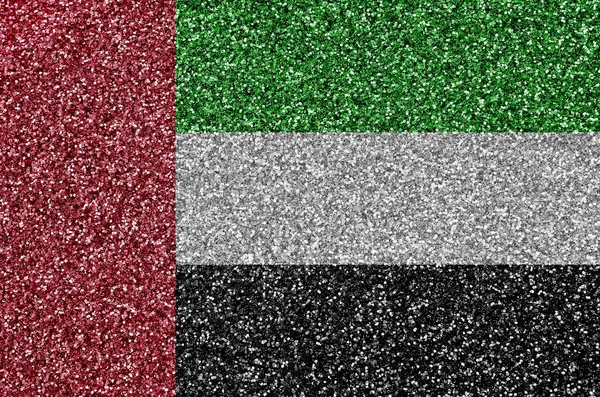 United Arab Emirates flag depicted on many small shiny sequins. Colorful festival background for disco party