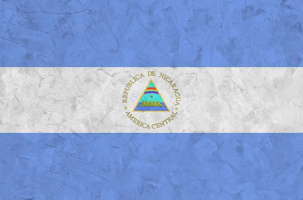 Nikaragujská Vlajka Vyobrazená Jasných Barvách Staré Reliéfní Omítce Zblízka Texturovaný — Stock fotografie