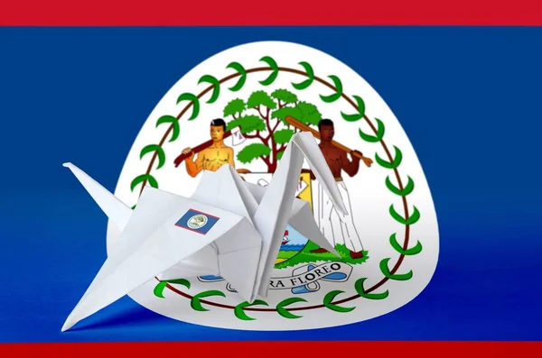 Belize Flagge Auf Papier Origami Kranich Flügel Dargestellt Orientalisches Konzept — Stockfoto