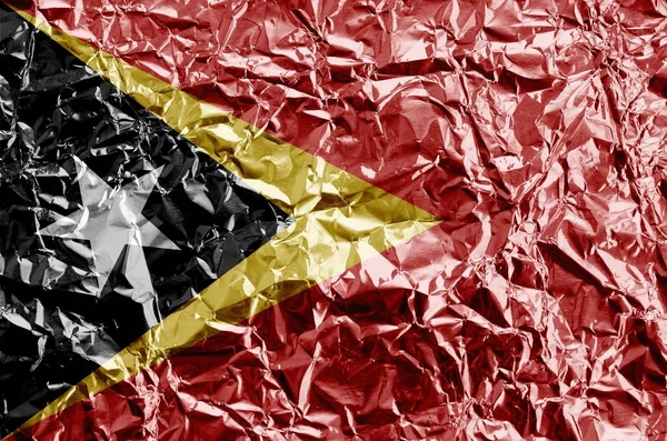 Σημαία Timor Leste Απεικονίζεται Χρώματα Μπογιάς Γυαλιστερό Τσαλακωμένο Φύλλο Αλουμινίου — Φωτογραφία Αρχείου