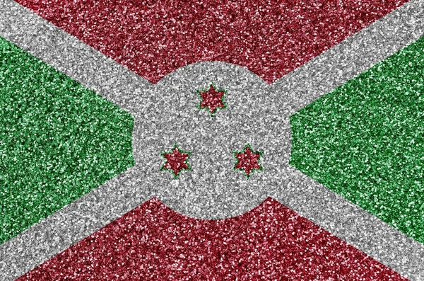 Burundi flag depicted on many small shiny sequins. Colorful festival background for disco party