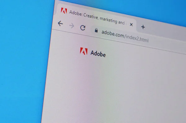 Homepage der Adobe-Website auf der Anzeige von PC, url - adobe.com. — Stockfoto
