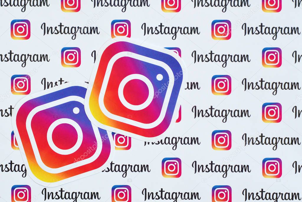 NY, USA - DECEMBER 5, 2019: Instagram pattern printed on paper with small instagram logos and inscriptions. Instagram is American photo and video-sharing social networking service owned by Facebook