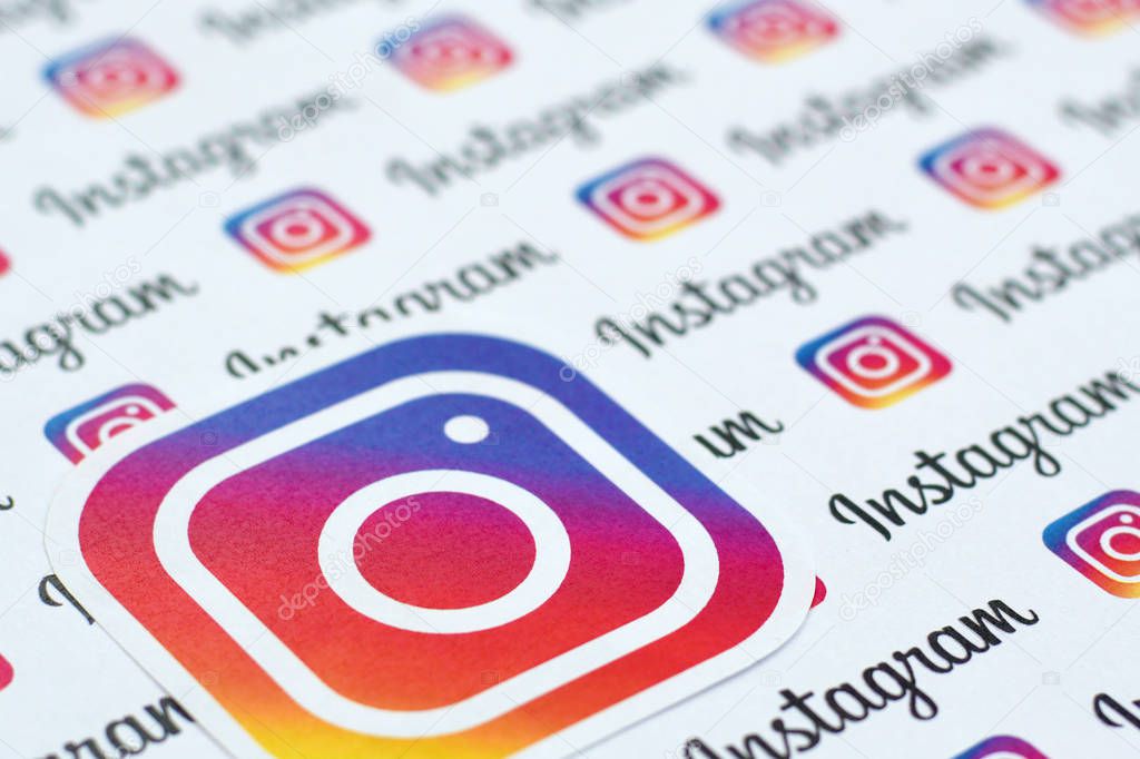 NY, USA - DECEMBER 5, 2019: Instagram pattern printed on paper with small instagram logos and inscriptions. Instagram is American photo and video-sharing social networking service owned by Facebook